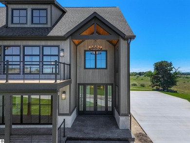 Commanding panoramic views of East Grand Traverse Bay from - photo 9