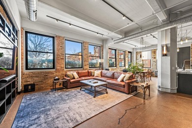 Statement residence in Milwaukee's Historic 3rd Ward! The foyer - photo 10