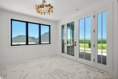 Commanding panoramic views of East Grand Traverse Bay from - photo 10