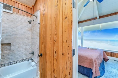 *Front Row* is one of the most breath-taking gulf front homes on - photo 31