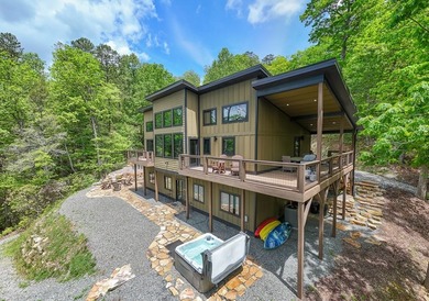 Secluded on Fontana Lake, this modern-mountain, custom-built - photo 3