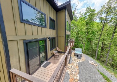 Secluded on Fontana Lake, this modern-mountain, custom-built - photo 8