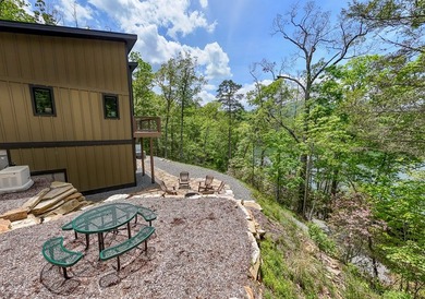 Secluded on Fontana Lake, this modern-mountain, custom-built - photo 9