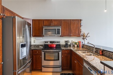 This bright and beautifully updated 2nd floor condo is nestled - photo 13