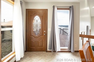 WOW! From the minute you walk in the door, the lake view is - photo 15