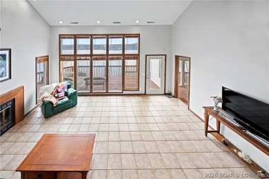 WOW! From the minute you walk in the door, the lake view is - photo 16