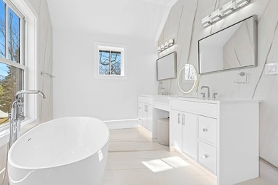 Experience luxury living in this stunning new construction by - photo 18