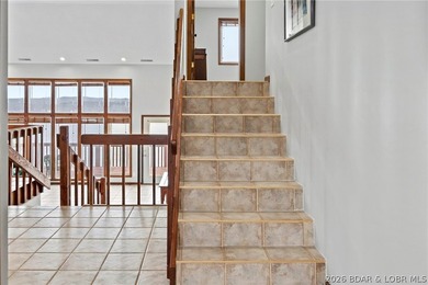 WOW! From the minute you walk in the door, the lake view is - photo 21