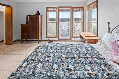 WOW! From the minute you walk in the door, the lake view is - photo 27