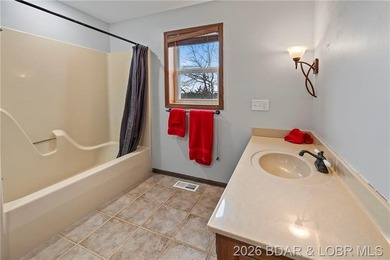 WOW! From the minute you walk in the door, the lake view is - photo 31