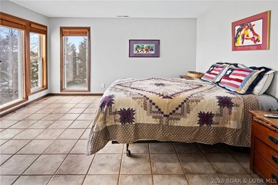 WOW! From the minute you walk in the door, the lake view is - photo 34