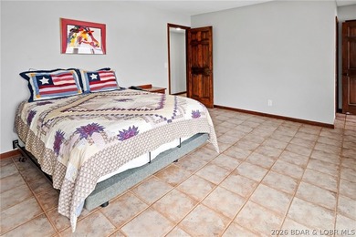 WOW! From the minute you walk in the door, the lake view is - photo 35