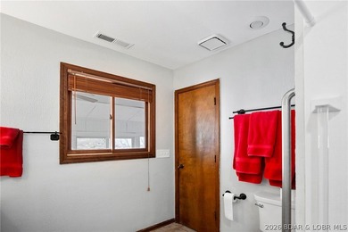 WOW! From the minute you walk in the door, the lake view is - photo 38