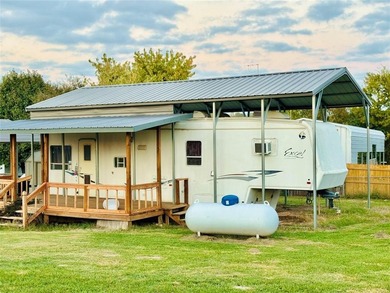 Discover the ultimate Lake Fork retreat with this fully fenced