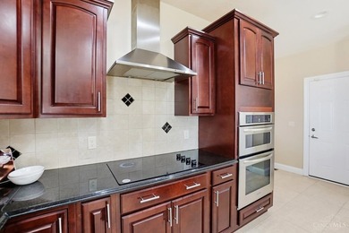 Enjoy exceptional flexibility & space in this thoughtfully - photo 11