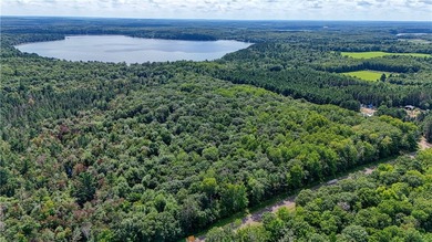 Introducing 13.07 wooded acres located west of Spooner in a - photo 18