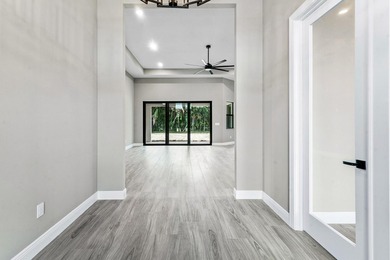 Exceptional new construction in Jupiter Farms with high-end - photo 6