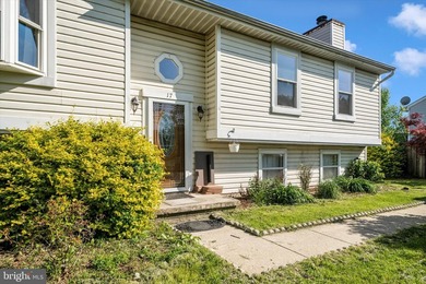 Welcome home to this charming 4-bedroom split foyer in Middle - photo 3