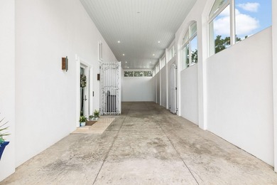 Built by original owners with a 8ft. concrete privacy wall, new - photo 49