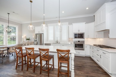 Welcome to this stunning custom-built home in the highly - photo 19
