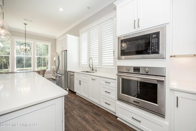 Welcome to this stunning custom-built home in the highly - photo 25