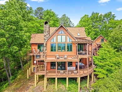 Perched within the sought-after gated community of Fontana Lake - photo 1