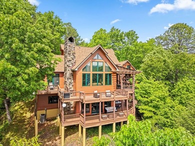 Perched within the sought-after gated community of Fontana Lake - photo 2