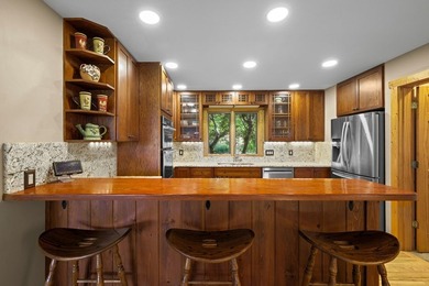 Perched within the sought-after gated community of Fontana Lake - photo 7