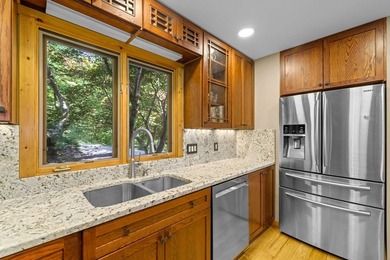 Perched within the sought-after gated community of Fontana Lake - photo 10