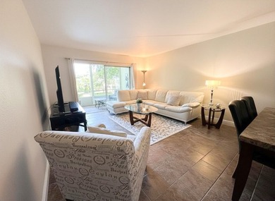 Charming 2-bedroom / 2-bath condo located in one of the - photo 2