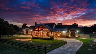 Welcome to 117 Hansma Way, a breathtaking custom ranch estate in