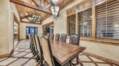 Welcome to 117 Hansma Way, a breathtaking custom ranch estate in