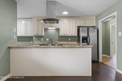 Welcome home to this beautifully updated 4-bedroom, 2-bath - photo 11