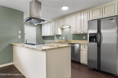 Welcome home to this beautifully updated 4-bedroom, 2-bath - photo 12