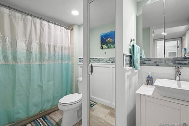 This beautifully updated coastal townhouse blends everyday - photo 19
