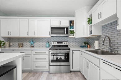 This beautifully updated coastal townhouse blends everyday - photo 26