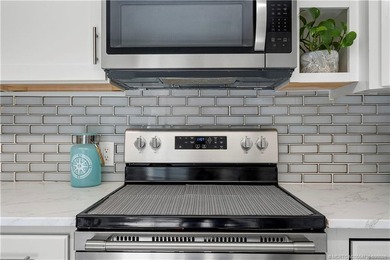 This beautifully updated coastal townhouse blends everyday - photo 29