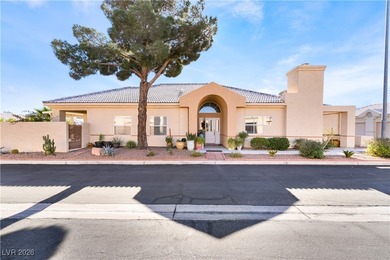A rare single-story townhome in the gated Promenade at the