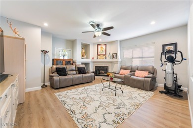 A rare single-story townhome in the gated Promenade at the