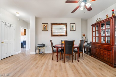 A rare single-story townhome in the gated Promenade at the