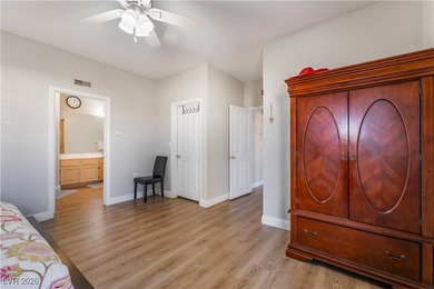 A rare single-story townhome in the gated Promenade at the