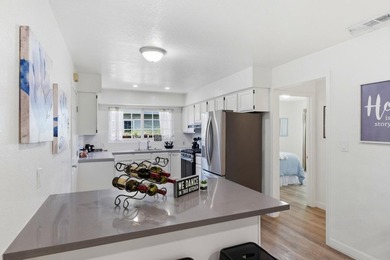 New Lower Price! This must see charming 3 bedroom, one and a - photo 6
