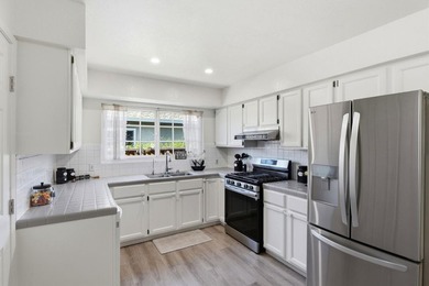 New Lower Price! This must see charming 3 bedroom, one and a - photo 8