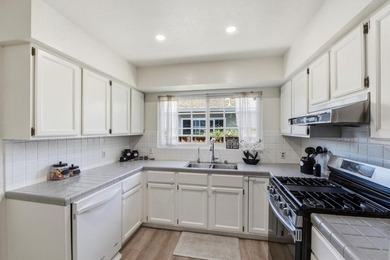 New Lower Price! This must see charming 3 bedroom, one and a - photo 10