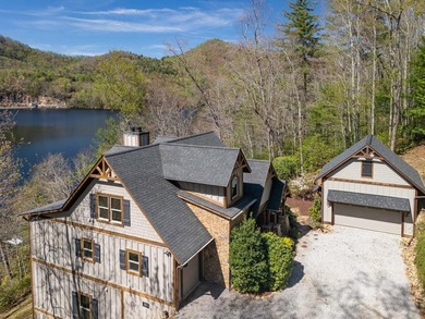 Nestled on a private cove of pristine Bear Creek Lake in the - photo 2