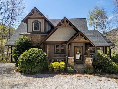 Nestled on a private cove of pristine Bear Creek Lake in the - photo 3