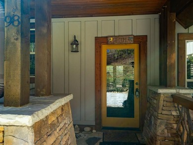 Nestled on a private cove of pristine Bear Creek Lake in the - photo 9
