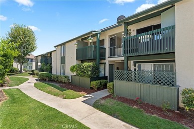 Welcome to this well-maintained upper-level condominium in the - photo 1