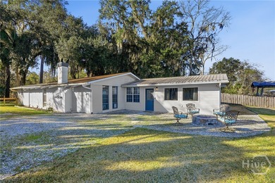 Stunning waterfront river home with deep water access on the - photo 3