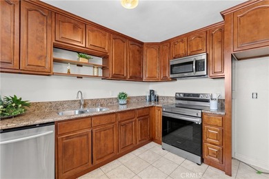Welcome to this well-maintained upper-level condominium in the - photo 3